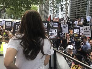 Stella Assange speaks to the crowd outside the Home Office