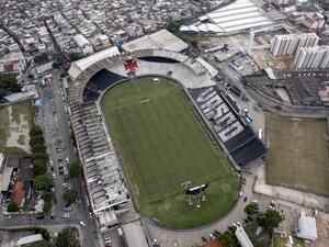 Aerial view show the Sao Januario stadium that belongs to Brazil´s football team Vasco da Gama, at the Sao Cristovao neighbourhood, Rio de Janeiro, Brazil on May 13, 2022. The arrival of foreign investors and Ronaldo´s millions to Brazilian football, could widen the gap between the clubs of the South American giant and its regional pairs. (Photo by Mauro PIMENTEL / AFP)