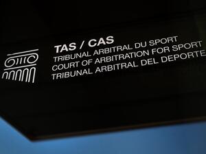 A picture taken on March 21, 2022 shows a sign and logo of the Court of Arbitration for Sport at their new headquarters in in Lausanne, western Switzerland. The Russian football team remains excluded from the qualifying play-offs for the 2022 World Cup at the end of March after the Court of Arbitration for Sport on March 18, 2022 rejected the Russian Federation's request to suspend Fifa's sanctions. (Photo by Fabrice COFFRINI / AFP)