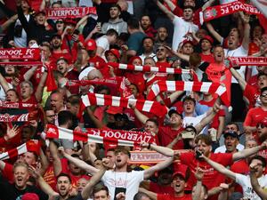 Liverpool supporters cheer prior to the UEFA Champions League final football match between Liverpool and Real Madrid at the Stade de France in Saint-Denis, north of Paris, on May 28, 2022. (Photo by FRANCK FIFE / AFP)