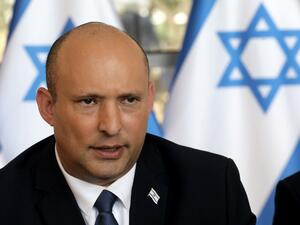 In this file photo taken on May 29, 2022, Israeli Prime Minister Naftali Bennett speaks during the weekly cabinet meeting in Jerusalem.(Photo by GIL COHEN-MAGEN / POOL / AFP) Israeli government could collapse over failure to pass bill upholding settler law
