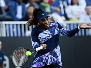 Serena Williams of the US, playing with Tunisia's Ons Jabeur, returns the ball to Japan's Shuko Aoyama and Taiwan's Chan Hao-ching during their women's doubles quarter final tennis match on day four of the Eastbourne International tennis tournament in Eastbourne, southern England on June 22, 2022. (Photo by Glyn KIRK / AFP)