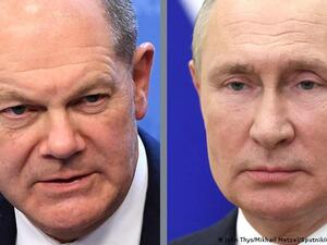 Schloz (L) Putin