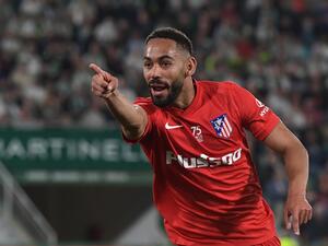 Atletico Madrid's Brazilian forward Matheus Cunha celebrates after scoring a goal during the Spanish league football match between Elche CF and Club Atletico de Madrid at the Martinez Valero stadium in Elche on May 11, 2022. (Photo by JOSE JORDAN / AFP)