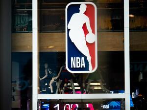 An NBA logo is shown at the 5th Avenue NBA store on March 12, 2020 in New York City. Jeenah Moon/Getty Images/AFP / Getty Images via AFP / GETTY IMAGES NORTH AMERICA / Jeenah Moon