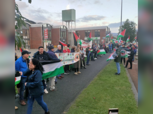Irish fans meet Israeli team with Palestinian flags 
