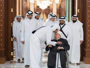 أمير قطر والشيخ القرضاوي