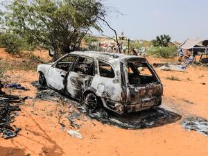 The remains of a police car following an explosion provocked by Al-Shabaab militants' during an attacke to a police station on the outskirts of Mogadishu, Somalia, on February 16, 2022. (Photo by Hassan Ali Elmi / AFP) Al-Shabaab