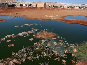 Dirty water puddles in Syria 