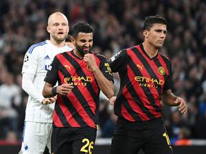 Manchester City's Algerian midfielder Riyad Mahrez (C) reacts after missing a penalty during the UEFA Champions League 1st round day 4 group G football match FC Copenhagen vs Manchester City in Copenhagen, Denmark, on October 11, 2022. (Photo by Jonathan NACKSTRAND / AFP)