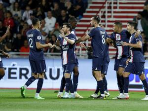 Paris Saint-Germain's French forward Kylian Mbappe (2ndR) celebrates with teammates after scoring a goal during the French L1 football match between AC Ajaccio and Paris Saint-Germain (PSG) at the Francois Coty Stadium in Ajaccio, Corsica, on October 21, 2022. (Photo by Pascal Pochard-Casabianca / AFP)