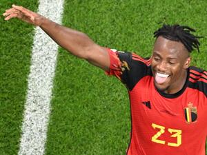 Belgium's forward #23 Michy Batshuayi celebrates scoring the opening goal during the Qatar 2022 World Cup Group F football match between Belgium and Canada at the Ahmad Bin Ali Stadium in Al-Rayyan, west of Doha on November 23, 2022. (Photo by Antonin THUILLIER / AFP)