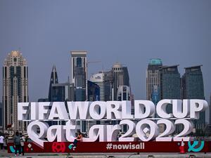 People visit the corniche adorned with a FIFA sign in Doha on November 5, 2022, ahead of the Qatar 2022 FIFA World Cup football tournament. (Photo by Jewel SAMAD / AFP)