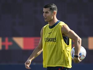 Unknown Portugal's forward Cristiano Ronaldo takes part in a training session at the Al Shahaniya SC training site in Al Samriya, northwest of Doha, on November 22, 2022, during the Qatar 2022 World Cup football tournament. (Photo by PATRICIA DE MELO MOREIRA / AFP)