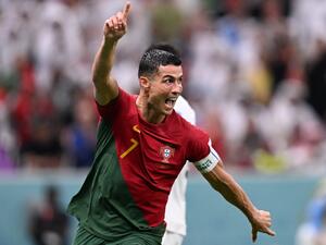 Portugal's forward #07 Cristiano Ronaldo celebrates after his team's first goal during the Qatar 2022 World Cup Group H football match between Portugal and Uruguay at the Lusail Stadium in Lusail, north of Doha on November 28, 2022. (Photo by Kirill KUDRYAVTSEV / AFP)