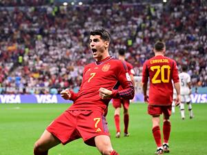 Spain's forward #07 Alvaro Morata (L) celebrates scoring his team's first goal during the Qatar 2022 World Cup Group E football match between Spain and Germany at the Al-Bayt Stadium in Al Khor, north of Doha on November 27, 2022. (Photo by JAVIER SORIANO / AFP)