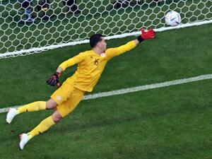 Tunisia's goalkeeper #16 Aymen Dahmen concedes a goal from a shot by Australia's forward #15 Mitchell Duke (not seen) during the Qatar 2022 World Cup Group D football match between Tunisia and Australia at the Al-Janoub Stadium in Al-Wakrah, south of Doha on November 26, 2022. (Photo by Antonin THUILLIER / AFP)