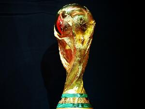 This photograph taken on October 7, 2022 shows the FIFA World Cup trophy displayed during the FIFA World Cup Trophy Tour, in Paris. The 2022 FIFA World Cup will be held from November 20 to December 18, 2022, in Doha. (Photo by FRANCK FIFE / AFP)
