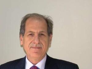 فيصل عباس  شغل منصب وزير النقل في 2011-2012 