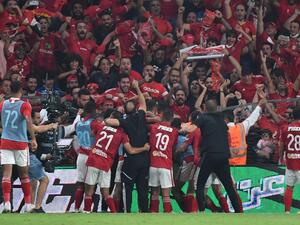 Ahly's players celebrate with the fans after winning the Egyptian Super Cup football match between Zamalek and Al-Ahly at the Hazza bin Zayed stadium in al-Ain on October 28, 2022. (Photo by Ryan LIM / AFP)