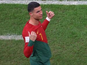 Portugal's forward #07 Cristiano Ronaldo prepares to come on during the Qatar 2022 World Cup round of 16 football match between Portugal and Switzerland at Lusail Stadium in Lusail, north of Doha on December 6, 2022. (Photo by ADRIAN DENNIS / AFP)