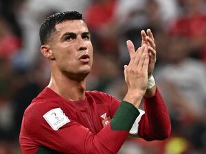 Portugal's forward #07 Cristiano Ronaldo applauds at the crowd after qualifying to the next round after defeating Switzerland 6-1 in the Qatar 2022 World Cup round of 16 football match between Portugal and Switzerland at Lusail Stadium in Lusail, north of Doha on December 6, 2022. (Photo by Anne-Christine POUJOULAT / AFP)