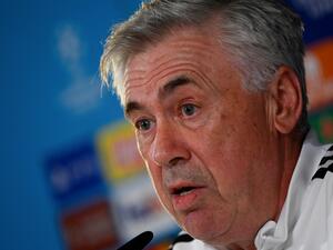 Real Madrid's Italian coach Carlo Ancelotti addresses a press conference at the Ciudad Real Madrid training complex in Valdebebas, outskirts of Madrid, on November 1, 2022, on the eve of their UEFA Champions League football match against Celtic FC. (Photo by PIERRE-PHILIPPE MARCOU / AFP)