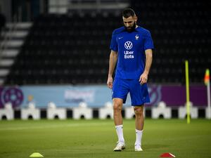 France's forward Karim Benzema looks down during a training session at the Jassim-bin-Hamad Stadium in Doha on November 17, 2022, ahead of the Qatar 2022 World Cup football tournament. (Photo by FRANCK FIFE / AFP)