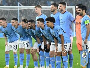 Manchester City's players pose for a picture prior to the UEFA Champions League group G football match between Manchester City and Sevilla at the Etihad Stadium in Manchester, north west England on November 2, 2022. (Photo by Oli SCARFF / AFP)
