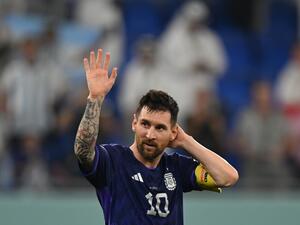 Argentina's forward #10 Lionel Messi waves to supporters after his team won the Qatar 2022 World Cup Group C football match between Poland and Argentina at Stadium 974 in Doha on November 30, 2022. (Photo by ANDREJ ISAKOVIC / AFP)