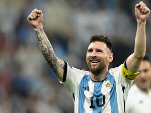  Argentina's forward #10 Lionel Messi celebrates after defeating Croatia 3-0 in the Qatar 2022 World Cup football semi-final match between Argentina and Croatia at Lusail Stadium in Lusail, north of Doha on December 13, 2022. (Photo by JUAN MABROMATA / AFP)