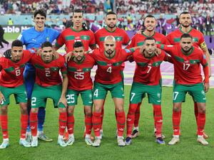 Morocco team players pose for pictures before the Qatar 2022 World Cup quarter-final football match between Morocco and Portugal at the Al-Thumama Stadium in Doha on December 10, 2022. (Photo by KARIM JAAFAR / AFP)