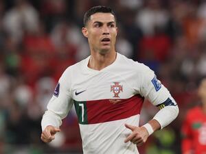 Portugal's forward #07 Cristiano Ronaldo reacts during the Qatar 2022 World Cup quarter-final football match between Morocco and Portugal at the Al-Thumama Stadium in Doha on December 10, 2022. (Photo by KARIM JAAFAR / AFP)