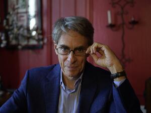 Human Rights Watch (HRW) executive director Kenneth Roth poses for a portrait in New York City on August 24, 2022. (Photo by ANGELA WEISS / AFP) Harvard University