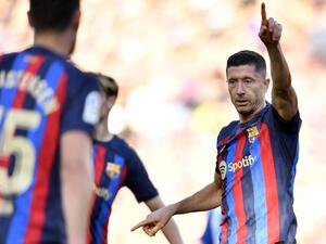 Barcelona's Polish forward Robert Lewandowski gestures during the Spanish League football match between FC Barcelona and RCD Espanyol at the Camp Nou stadium in Barcelona on December 31, 2022. (Photo by Pau BARRENA / AFP)