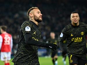 Paris Saint-Germain's Brazilian forward Neymar celebrates after scoring the opening goal during the French L1 football match between Paris Saint-Germain (PSG) and Stade de Reims at the Parc des Princes stadium in Paris on January 29, 2023. (Photo by Anne-Christine POUJOULAT / AFP)