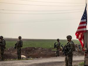 U.S. forces patrol in the vicinity of the Hori rehabilitation centre for children of suspected Islamic State (IS) group, in the town of Tel Maaruf in Syria's northeastern Hasakeh province, on December 15, 2022. (Photo by Delil SOULEIMAN / AFP) ISIS leader