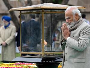 India's Prime Minister Narendra Modi pays his respect at the Mahatma Gandhi memorial at Rajghat on Gandhi's death anniversary in New Delhi on January 30, 2023.(Photo by Sajjad HUSSAIN / AFP) India's Prime Minister Narendra Modi