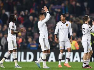 Manchester United's players react at the end of the UEFA Europa League round of 32 first-leg football match between FC Barcelona and Manchester United at the Camp Nou stadium in Barcelona, on February 16, 2023. (Photo by Josep LAGO / AFP)