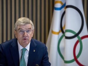 International Olympic Committee (IOC) President Thomas Bach speaks at the start of the IOC Executive Board meeting at the Olympic House in Lausanne, Switzerland on December 5, 2022. (Photo by DENIS BALIBOUSE / POOL / AFP)