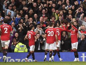 Manchester United's English striker Jadon Sancho (R) celebrates scoring the team's third goal during the English Premier League football match between Manchester United and Leicester City at Old Trafford in Manchester, north west England, on February 19, 2023. (Photo by Oli SCARFF / AFP)