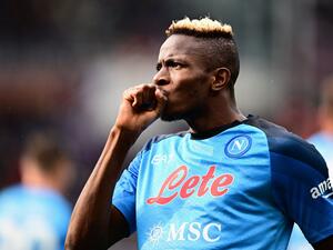 Napoli's Nigerian forward Victor Osimhen celebrates after scoring his side's third goal during the Italian Serie A football match between Torino and Napoli on March 19, 2023 at the Olympic stadium in Turin. (Photo by Marco BERTORELLO / AFP)