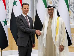 الرئيسان السوري بشار الأسد والإماراتي الشيخ محمد بن زايد آل نهيان (أ ف ب)