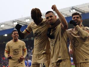 Chelsea's Croatian midfielder Mateo Kovacic (2R) celebrates scoring the team's third goal with Chelsea's English defender Trevoh Chalobah (2L) during the English Premier League football match between Leicester City and Chelsea at King Power Stadium in Leicester, central England on March 11, 2023. (Photo by Darren Staples / AFP)