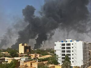 Smoke billows above residential buildings in Khartoum on April 16, 2023, as fighting in Sudan raged for a second day in battles between rival generals. (Photo by AFP) Sudan