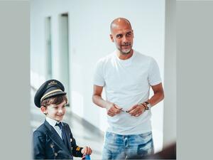 Manchester city’s pep guardiola celebrates world pilots’ day with Etihad airways