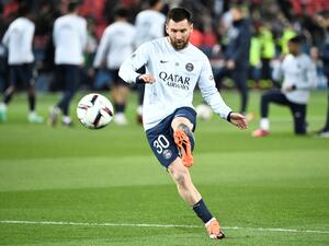 Paris Saint-Germain's Argentine forward Lionel Messi shoots during the warm up session before the French L1 football match between Paris Saint-Germain (PSG) and Olympique Lyonnais (OL) at The Parc des Princes Stadium in Paris on April 2, 2023. (Photo by STEPHANE DE SAKUTIN / AFP)