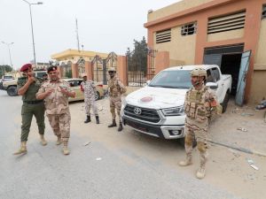 A picture taken during a media tour organised by the Libyan Ministry of Defence's media office shows members of a military unit deployed in the western city of Zawiya on May 14, 2023, following clashes between armed groups. (Photo by Mahmud TURKIA / AFP) Libya