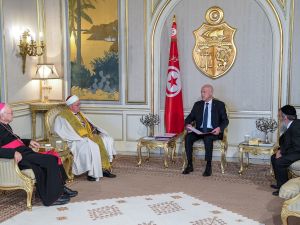A handout picture provided by the Tunisian Presidency Press Service on May 17, 2023, shows Tunisian President Kais Saied (2-R) meeting with his country's Bishop Ilario Antoniazzi (L) Chief Rabbi Bitten Haiem (R) and Mufti Hichem Ben Mahmoud (2-L) at the Carthage Palace in Tunis. (Photo by Tunisian Presidency / AFP) Tunisian president Ghriba Synagogue