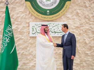 This handout picture provided by the Saudi Royal Palace on May 19, 2023 shows Saudi Crown Prince Mohammed bin Salman (L) shaking hands with Syria's President Bashar al-Assad on the sidelines of the Arab Summit meeting in Jeddah. (Photo by Bandar AL-JALOUD / Saudi Royal Palace / AFP) Syria, Saudi Arabia